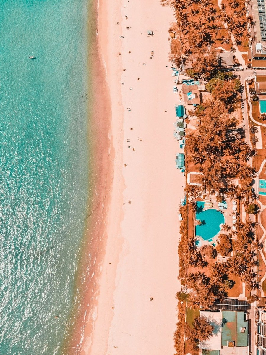 Aerial view of a long sandy beach in Phuket